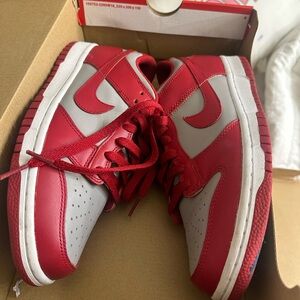 Red and grey Nike low dunks  7Y